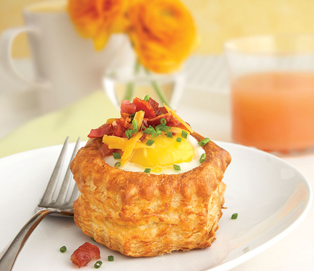 An image of prepared Bacon, Egg and Cheese Pastry Shells made with Pepperidge Farm® Puff Pastry Shells, eggs, cheese, bacon and chives.