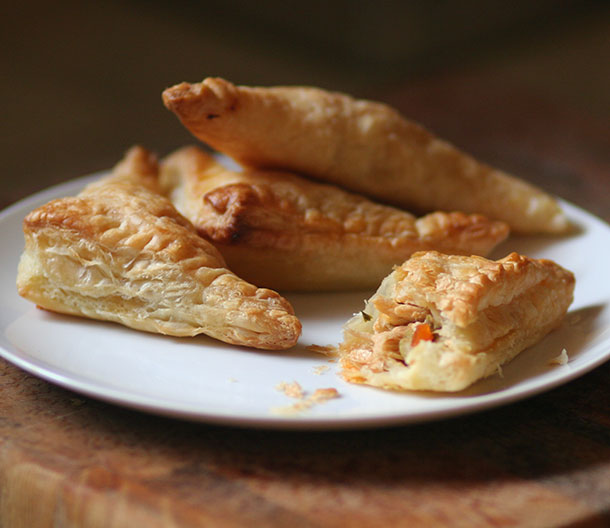 Image of prepared Empanadas de Pollo (Chicken Turnovers) made with Pepperidge Farm® Puff Pastry and Campbell's® Condensed Chicken Broth.