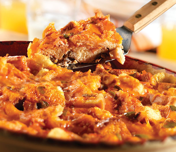 An image of prepared Fiesta Breakfast Casserole made with sausage, Pepperidge Farm® White Calcium Enriched Sliced Sandwich Bread, Cheddar cheese, Pace® Picante Sauce, eggs and milk.
