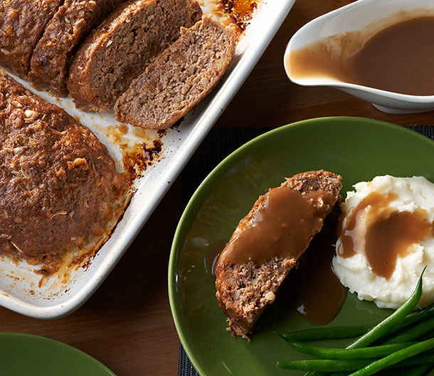 An image of prepared Herb Seasoned Meatloaves made with ground beef, Pepperidge Farm® Herb Seasoned Stuffing, eggs, onion, ketchup, Worcestershire sauce and Campbell's® Beef Gravy.